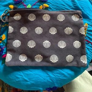 Fun baby blue seashell Carnival brand zip up canvas bag. Apx 7 x 10“. EUC